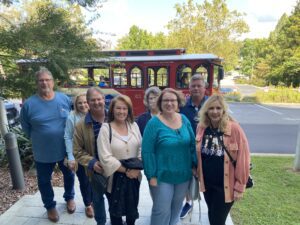 SEPA members pose in front of the trolley tour trolley